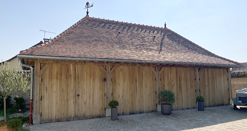 garage pans de bois briques et chaux